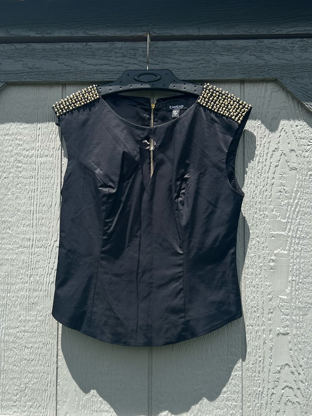 Bebe Black Sleeveless Blouse with Gold Studded Shoulders & Keyhole Zip Detail